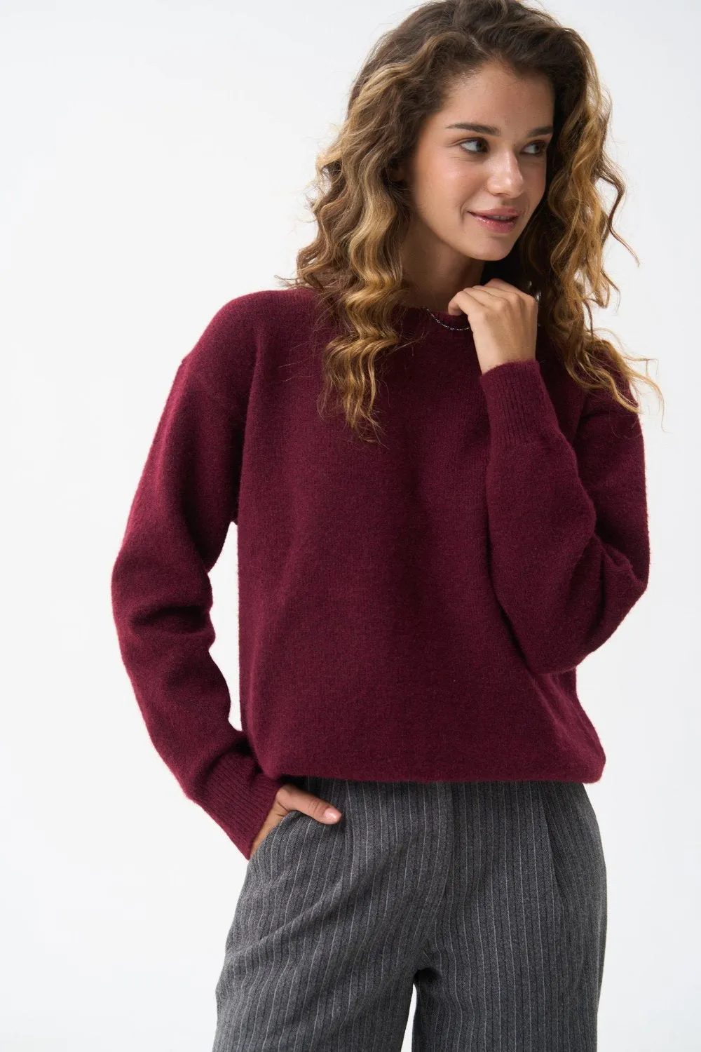 Wool sweater in color red